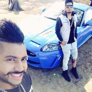 A Kay And Sukhe With Sports Car
