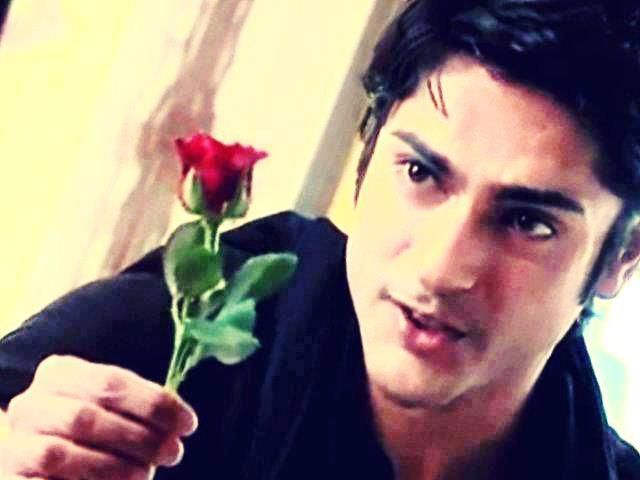 Ashish Kapoor Holding Rose