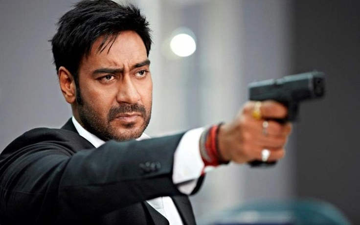 Ajay Devgan Holding Gun