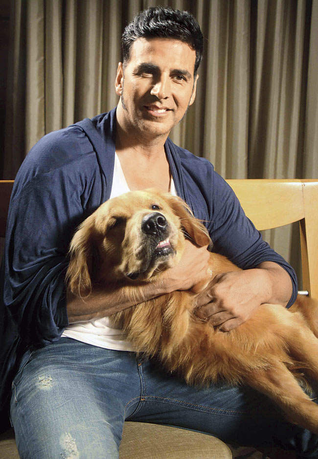Akshay Kumar Holding Dog