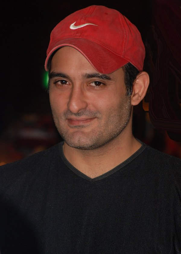 Akshaye Khanna Wearing Red Cap