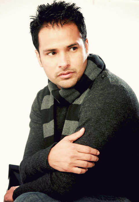 Amrinder Gill Giving Pose