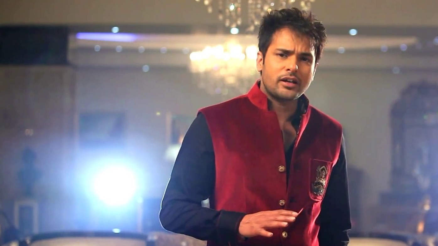 Amrinder Gill Wearing Red Jacket