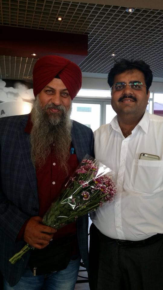 Amritpal Singh Billa Holding Flowers