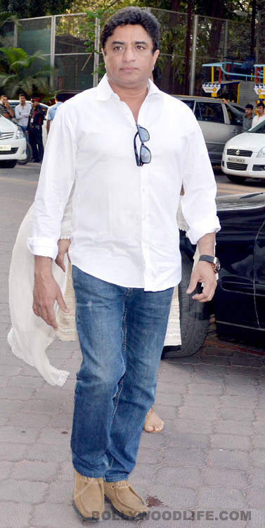 Anand Raj Anand Wearing White Shirt