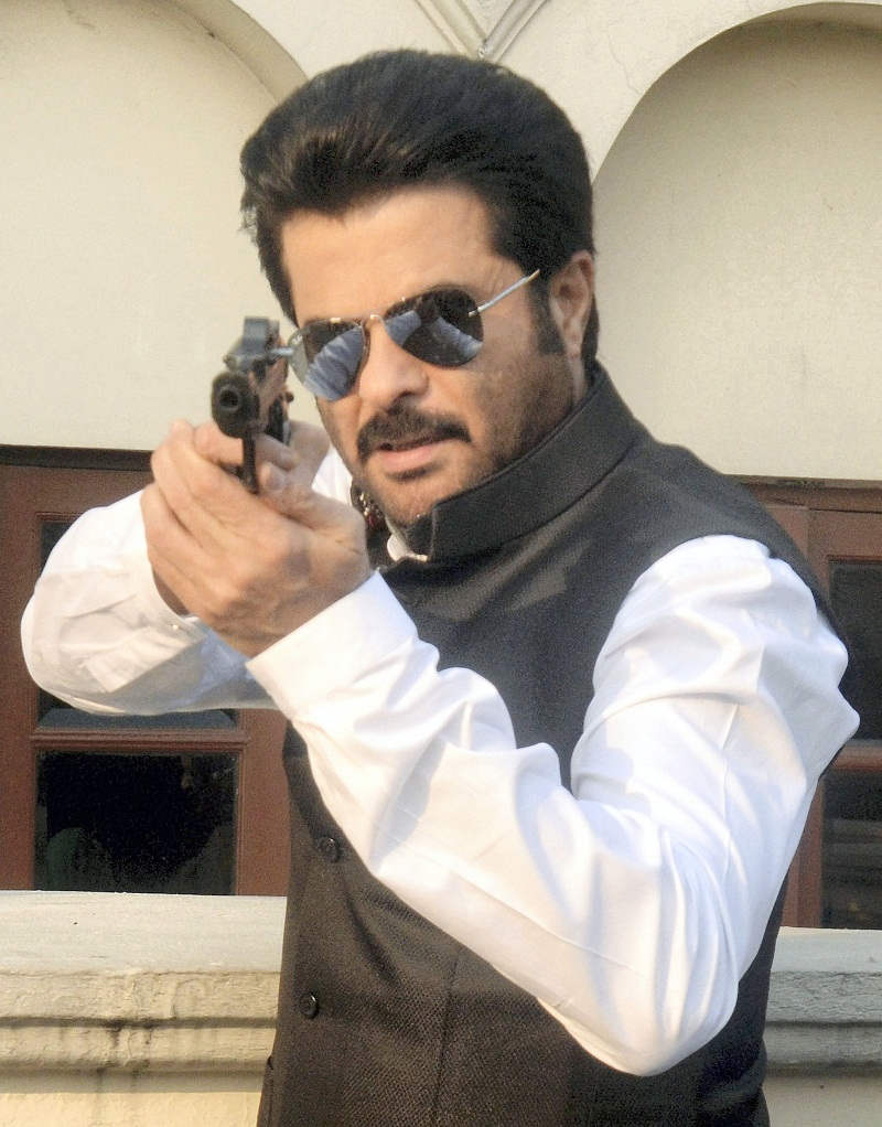 Anil Kapoor Holding Gun