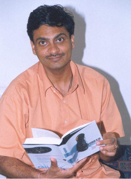 Aniruddha Bahal Holding Book