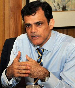Anuj Puri In His Office
