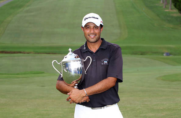 Arjun Atwal Holding Champion Trophy