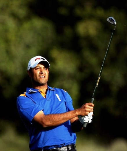 Arjun Atwal Holding Golf Stick