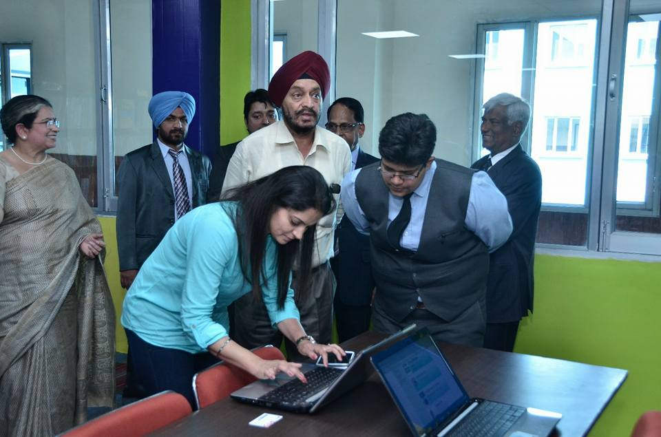 Avneet Kaur Sidhu Using Laptop