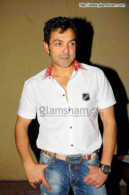 Bobby Deol Wearing White Shirt And Blue Jeans
