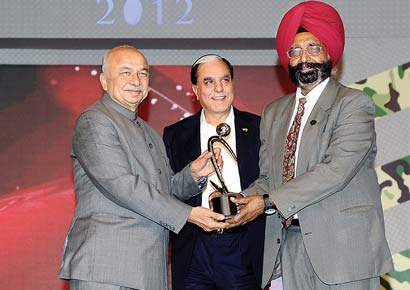 Brigadier Kuldip Singh Chandpuri Holding Award