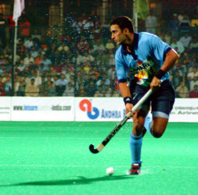 Deepak Thakur Holding Hockey Stick