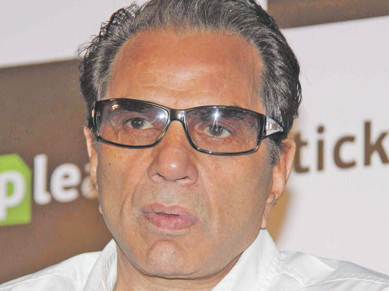 Dharmendra Thinking Pose Picture