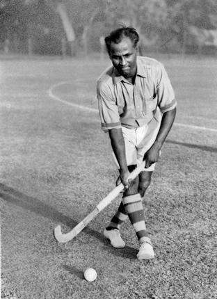Dhyan Chand Playing Hockey