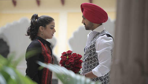 Diljit Dosanjh Giving Roses To A Girl Image