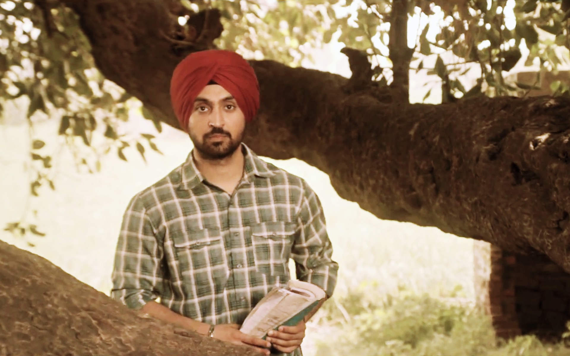 Diljit Dosanjh Holding Register In His Hand