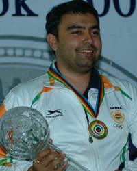 Gagan Narang Holding Trophy