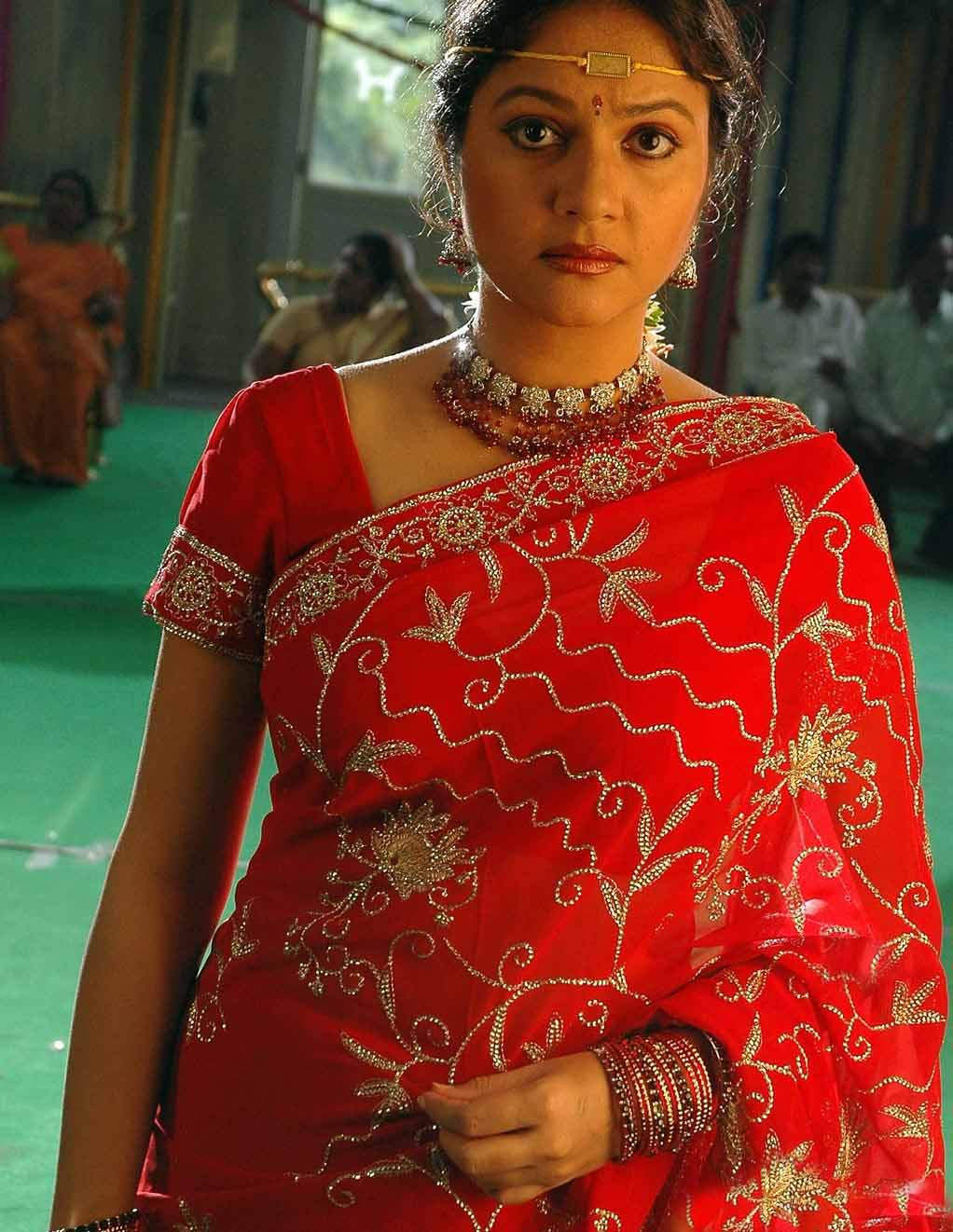 Gracy Singh In Red Saree