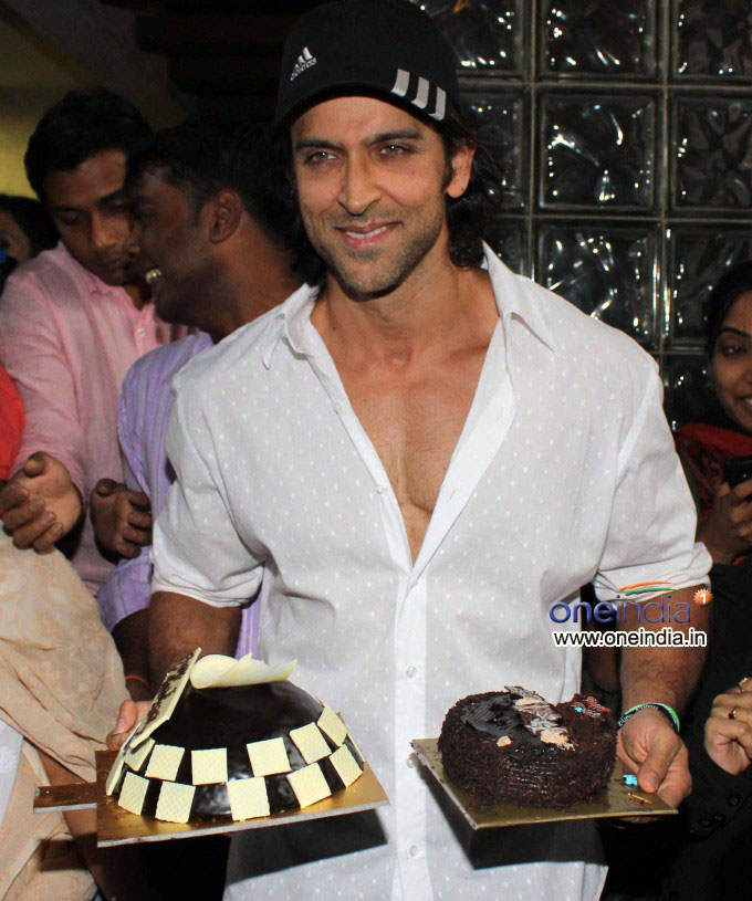 Hrithik Roshan Holding Cake