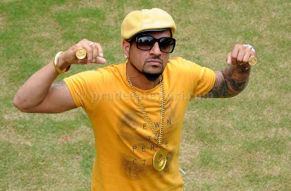 Jazzy B Wearing Yellow Cap And Tshirt