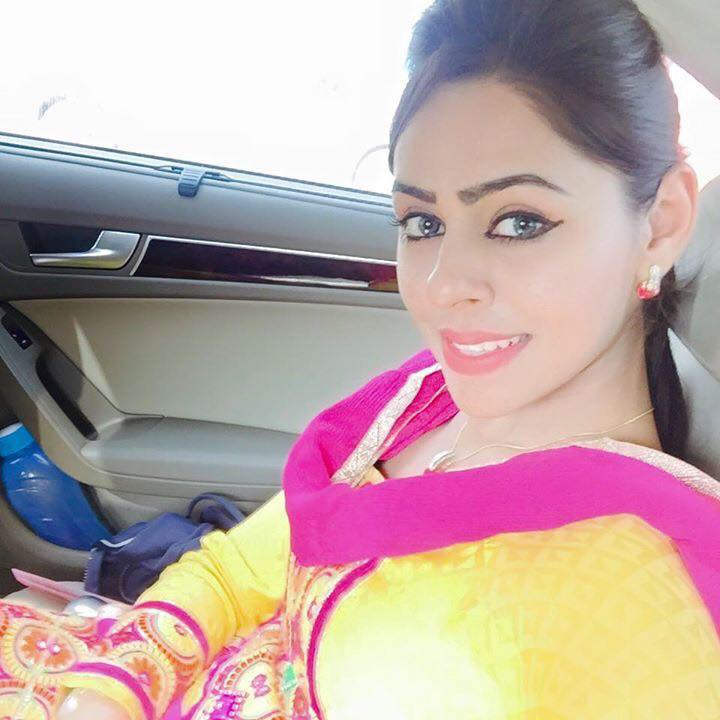 Jenny Johal In Yellow Suit