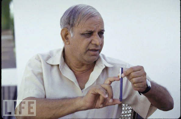 Kanshi Ram Holding A Pen