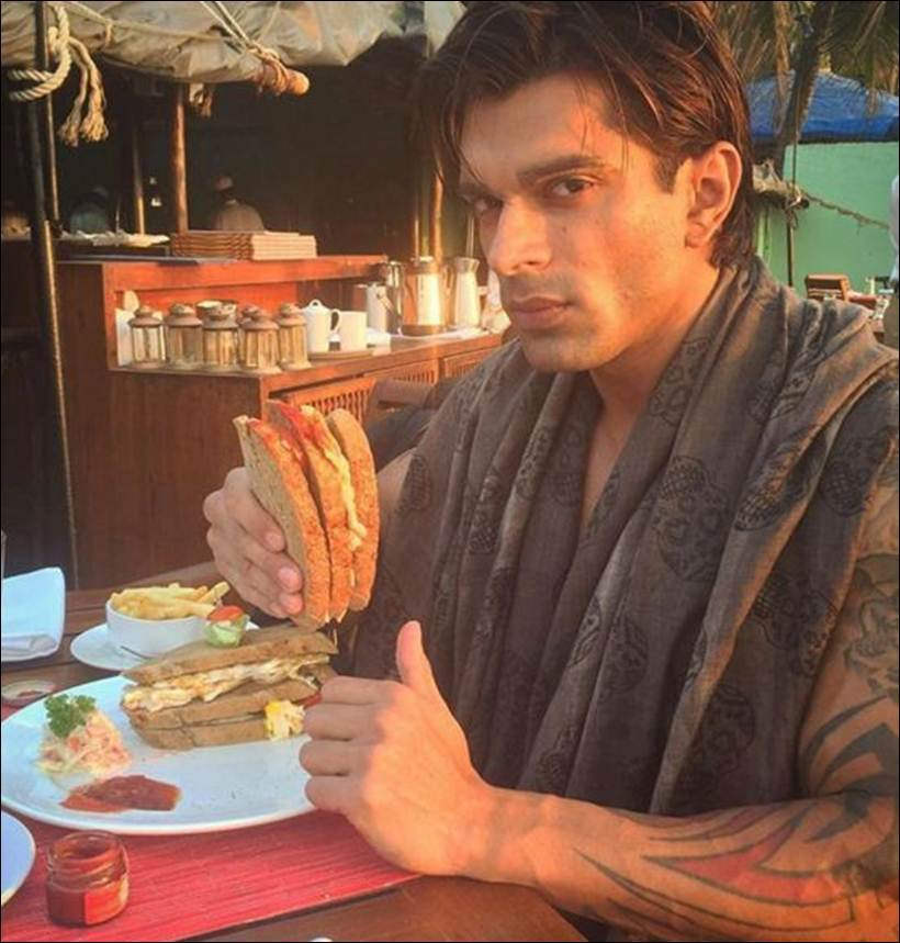 Karan Singh Grover Eating Sandwich