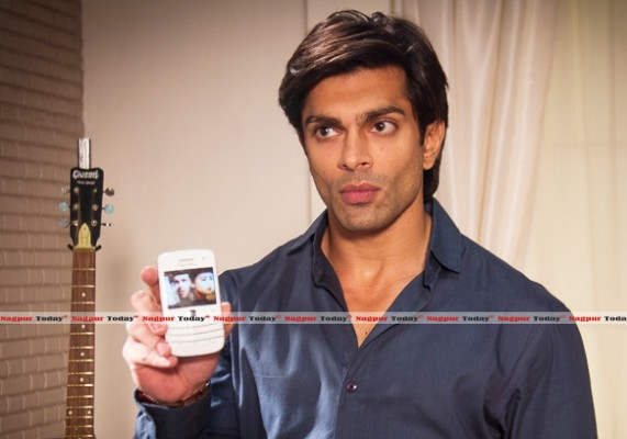Karan Singh Grover Showing Phone
