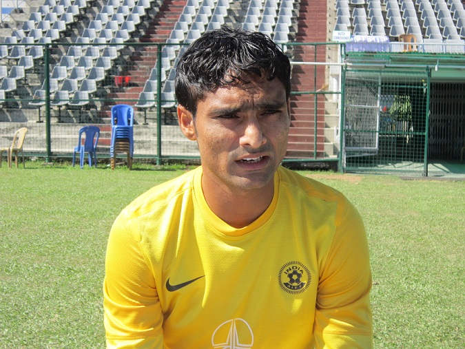 Karanjit Singh Wearing Yellow Shirt