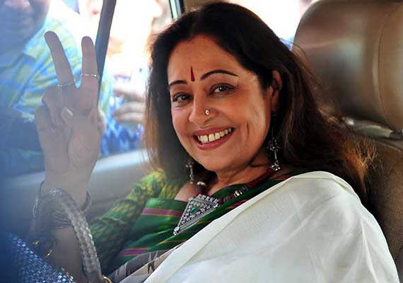 Kirron Kher Showing Victory Sign