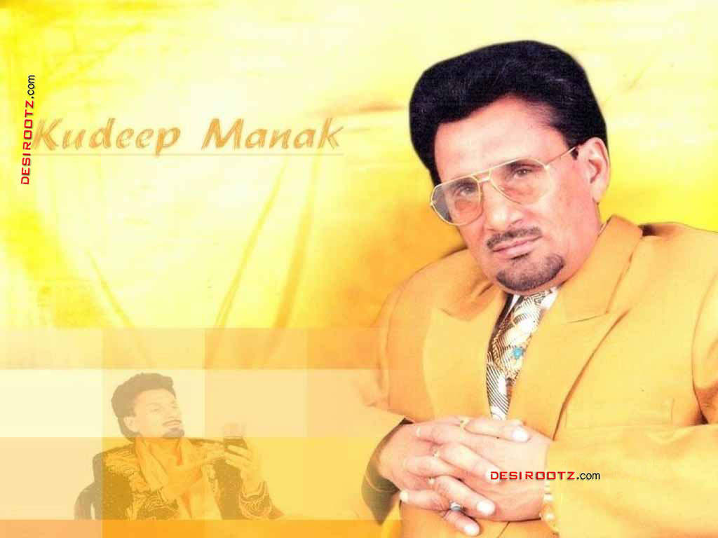 Kuldeep Manak Wearing Yellow Coat