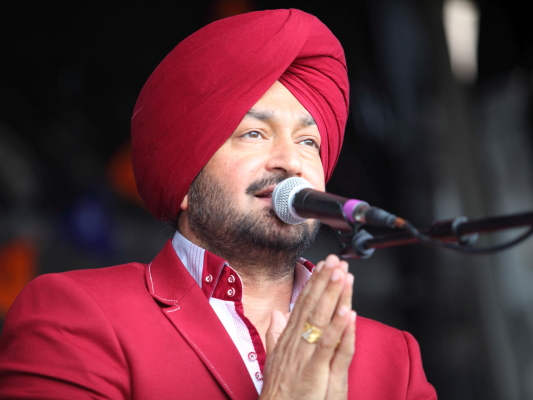 Malkit Singh In Red Coat