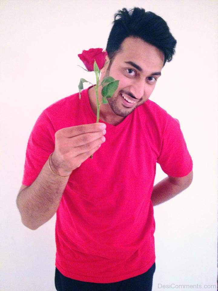 Maninder Kailey Holding Rose