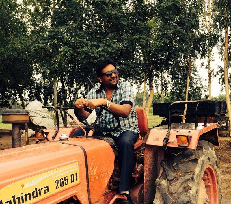 Manjit Pappu Sitting On Tractor