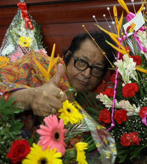 Manoj Kumar Holding Flower
