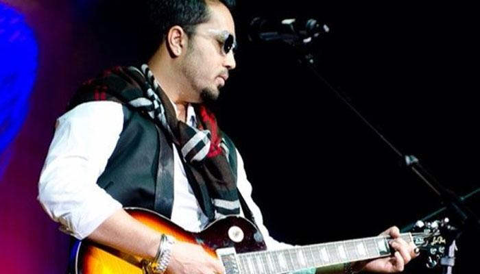 Singer Mika Singh Playing Guitar