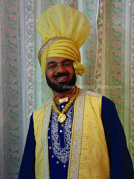 Pammi Bai  In Yellow And Blue Drees