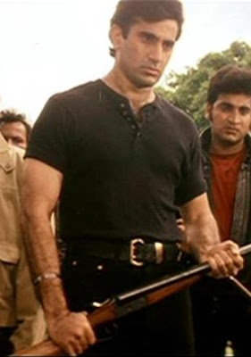 Parmeet Sethi Holding Gun