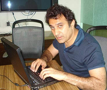 Parmeet Sethi Using Laptop