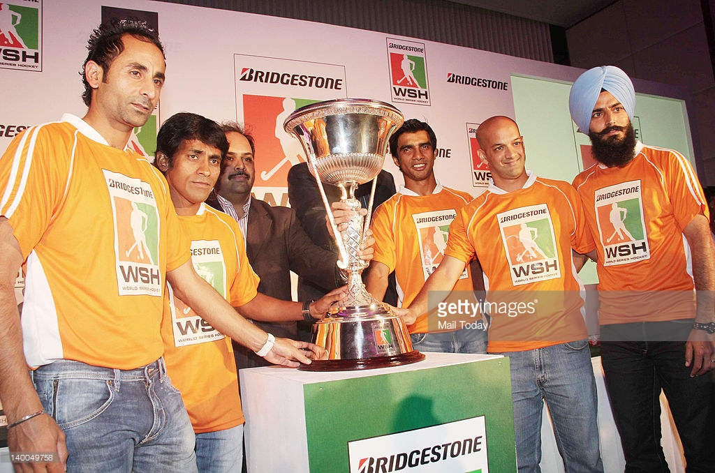 Prabhjot Singh  And His Team Member Holding Awart
