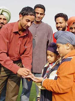 Prabhjot Singh Giving Autograph