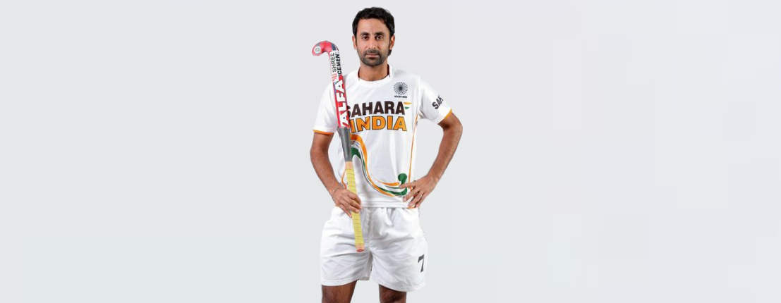Prabhjot Singh Holding Hockey Stick