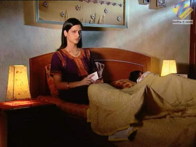 Prabhleen Sandhu Sitting On Bed