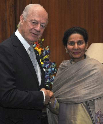 Preneet Kaurshaking Hand With Other Minister