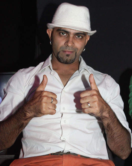Raghu Ram Wearing White Hat