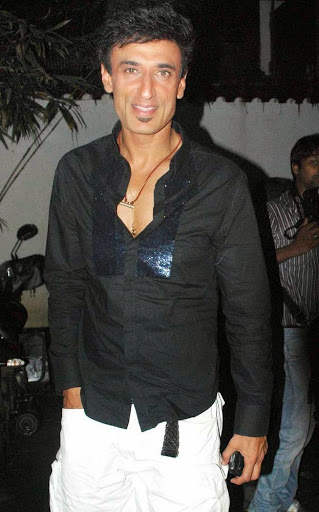 Rahul Dev In Black Shirt And White Trosure