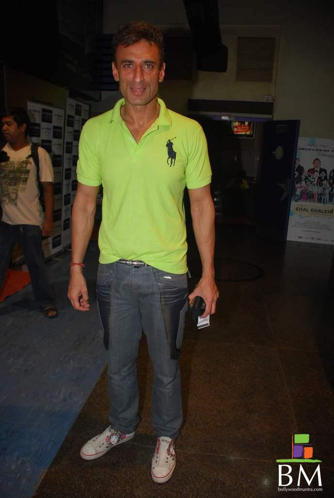 Rahul Dev Wearing Green T-shirt