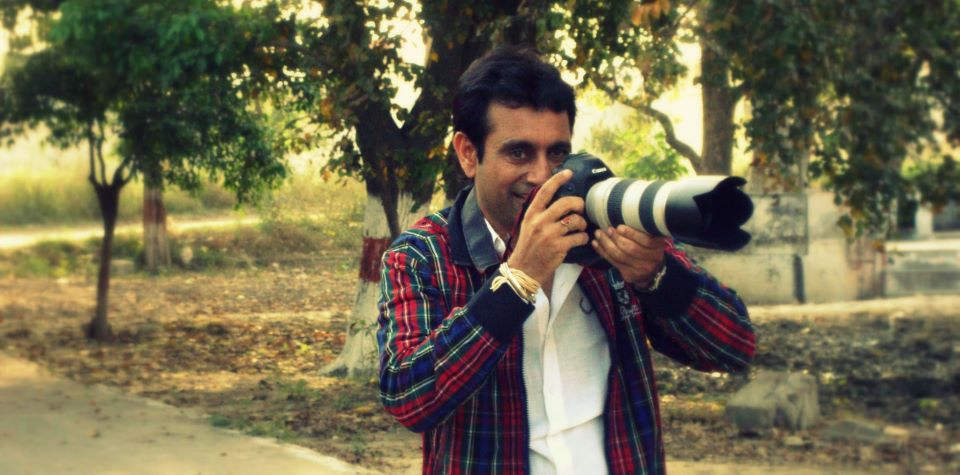 Raj Brar Holding Camera